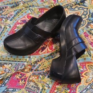 Dansko Black Leather Mules with Cushioned Comfort